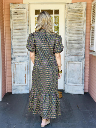 Black floral puff sleeve dress with pink and green print

Mallory Dress in black featuring pink floral pattern and gathered neckline

Black and olive floral long dress with vintage-inspired print