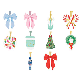 Blue bow Christmas ornament with gold hanger

Pink bow holiday ornament with metallic hanger

Christmas tree ornament with red bow and gold star accents

Festive wreath ornament with red ribbon and gold trim

Blue nutcracker ornament with gold hanging ribbon

Classic red bow Christmas ornament with gold hanger