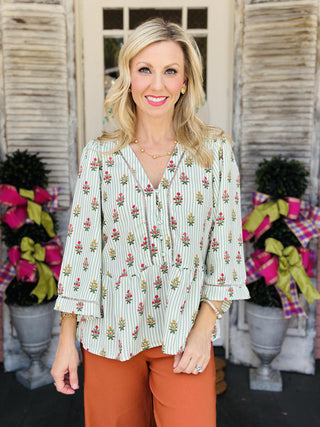 Janie top with green stripes and floral print