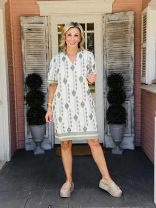 Women’s embroidered woven mini dress with pockets and lining