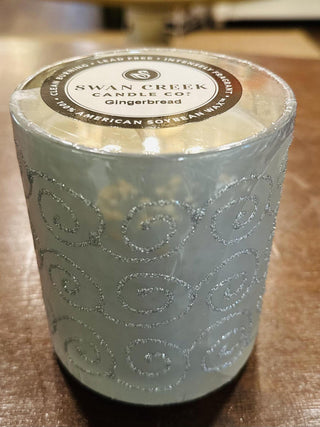 Swan Creek Shimmering Light Large Vase candles in assorted colors

Large soy wax candles in glitter swirl glass jars

Swan Creek 10 oz Shimmering Light candles with decorative glass design

Festive glass candles in red, green, yellow, and white hues

Colorful soy candles in elegant embossed vases by Swan Creek