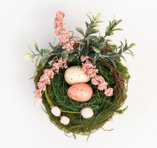 Easter nest with pastel eggs and faux spring flowers

Decorative Easter nest with moss, faux florals, and speckled eggs

Spring Easter nest décor with greenery and pastel eggs

Faux floral Easter nest centerpiece with decorative eggs