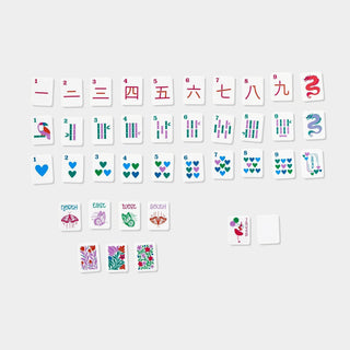 Mini Mahjer Complete Game Rackin Rosie Edition with colorful mahjong tiles, acrylic racks, neoprene playing mat, instruction cards, and drawstring storage bag.