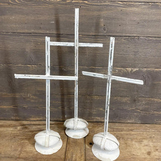 Belen-Rock Pedestal Cross with a distressed white finish and decorative rock-inspired base, available in large, medium, and small sizes.