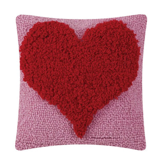 Looped heart hook pillow with red heart on pink background