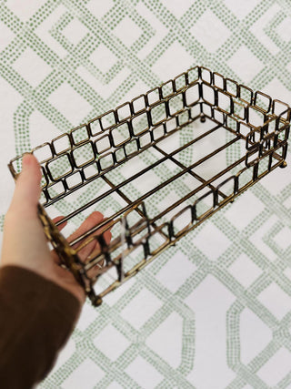 Aged gold square link guest towel caddy on patterned background

Decorative metal guest towel holder in aged gold finish

Elegant square wire caddy for guest towels or vanity decor

Rectangular gold metal guest towel caddy with grid design