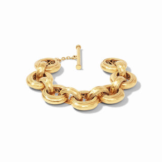 Cannes Demi Link Bracelet in gold by Julie Vos

24K gold plated Cannes bracelet with hammered links

Julie Vos Cannes Demi Link gold bracelet

Hammered gold link bracelet with toggle clasp

Elegant gold bracelet featuring openwork interior design