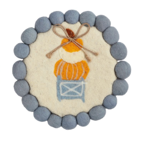 Round felted wool pumpkin topiary trivets with pom-pom trim featuring embroidered pumpkin and pumpkin topiary designs in soft blue, cream, and orange.