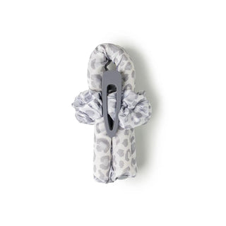 Gray leopard print satin heatless curling set with rod, two scrunchies, and a matching hair clip.
