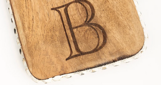 Mango wood mini cutting board with laser etched monogram