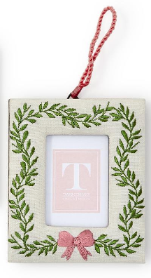 “Embroidered photo frame ornament with pink ribbon and greenery”

“Fabric hanging frame ornament with pink bow embroidery”

“Small decorative photo frame ornament with embroidered wreath design”

“Holiday embroidered frame ornament with ribbon loop”

“Set of embroidered hanging photo frame ornaments in assorted designs”