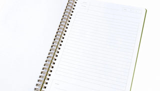 Blush pink prayer journal with structured sermon note layout