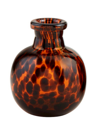 “Set of tortoise glass vases in small and large sizes”

“Decorative brown tortoise shell glass vases with rounded silhouette”

“Tortoiseshell glass bud vases with rich amber and black pattern”

“Hand-blown tortoise pattern glass vases for home decor”

