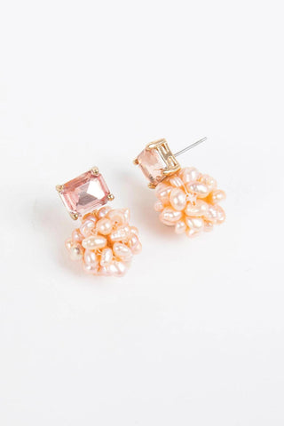 Gold-plated post earrings with rectangular crystal top and cluster of faux pearls

Elegant stud earrings featuring freshwater pearl-inspired cluster and crystal accent

Pearl Cluster Post Earrings in blush and white color options

