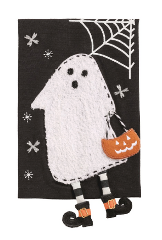 Black cotton Halloween hand towel featuring a bouclé ghost with dangle legs, striped socks, witch shoes, a pumpkin candy bucket, and spider web appliqué.