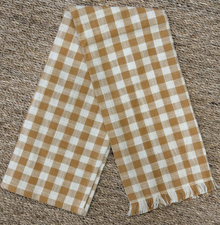 Orange gingham cotton tea towel with classic checkered pattern and fringed edge
