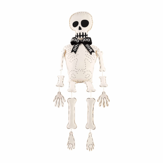 Life-sized stuffed canvas Skeleton Sitter with bendable cotton rope ligaments and black "Boo" ribbon, perfect for Halloween benches, couches, and seasonal home décor.