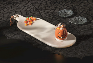 White marble paddle board with groove for light-up sitter

Rectangular marble board with decorative display section