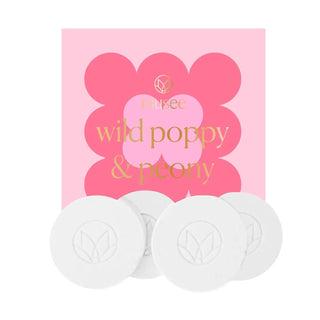 Musee wild poppy and peony shower steamers with pink floral packaging
