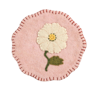 White floral felted wool trivet with scalloped edge