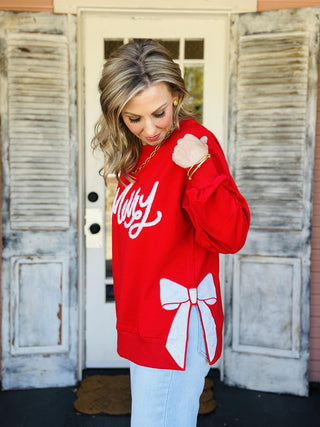 Red Lakelyn Merry Bow Sweater with white lettering and side bows

Festive red holiday sweater with “Merry” script and bow details

Christmas sweater with white Merry text and bow accents

Red knit holiday pullover with side bows and cheerful design

Lakelyn Merry Bow Sweater in bright red festive knit
