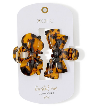 “Tortoise shell bow-shaped claw clips set of two”

“Brown and black tortoise twist hair clips on display card”

“Set of 2 tortoise bow hair clips made from acetate”

“Twisted bow tortoise claw clips for stylish hair looks”

“Tortoise hair claw clips with bow design for all hair types”