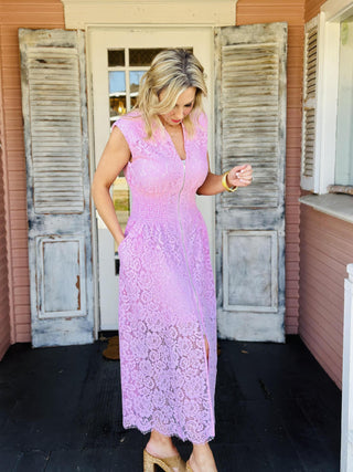 Light pink lace dress with front zip closure and fitted waist

Pink sleeveless lace midi dress with zipper front

Blush pink lace dress with smocked waist and front zipper

Feminine pink lace dress with V-neck and zip front

Elegant light pink lace dress with flattering silhouette