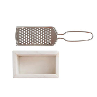 Marble and stainless steel handheld grater with white marble tray