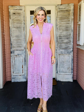 Light pink lace dress with front zip closure and fitted waist

Pink sleeveless lace midi dress with zipper front

Blush pink lace dress with smocked waist and front zipper

Feminine pink lace dress with V-neck and zip front

Elegant light pink lace dress with flattering silhouette