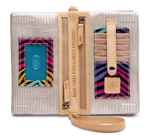 Consuela Celeste Uptown Crossbody with silver reptile-inspired exterior and woven strap

Interior view of Consuela Celeste Uptown Crossbody with card slots and zip compartments

Consuela Celeste crossbody purse with wristlet strap and silver textured finish

Back zipper pocket and magnetic closure on Consuela Celeste Uptown Crossbody bag