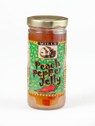 Mills Gourmet Peach Pepper Jelly 8 oz glass jar

Sweet and spicy peach pepper jelly by Mills Gourmet

Peach pepper jelly spread in gold-lidded jar

Mills Gourmet jam with peach and pepper flavor

Gourmet peach pepper jelly perfect for crackers or cheese