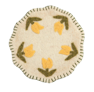 Yellow floral felted wool trivet with scalloped edge