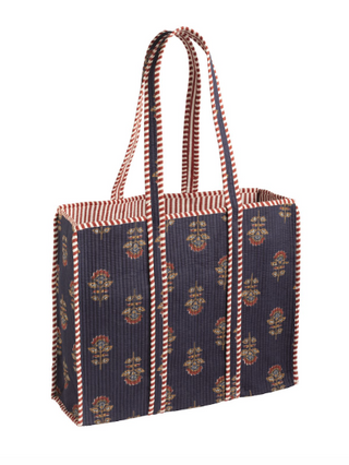 Navy Harvest Block Print Tote featuring a quilted cotton block print, contrast striped binding, and spacious interior with an interior pocket.