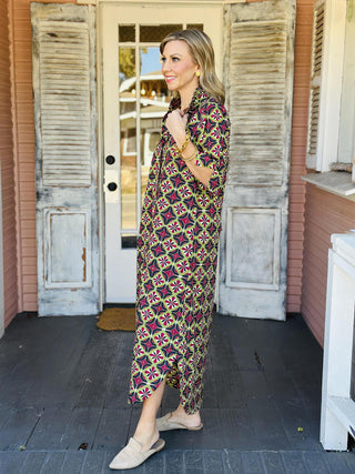 Amber Dress with bold geometric print and short sleeves

Geometric print button-front midi dress with pockets

Colorful patterned midi dress with relaxed fit and collared neckline