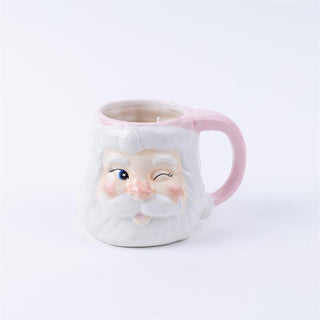 Holiday Sweet Grace Santa Mug Candle with pink handle

Winking Santa ceramic mug candle with Sweet Grace scent

Festive Santa mug candle in soft pink and white

Sweet Grace holiday candle in ceramic Santa cup

Pink-handled Santa candle mug for Christmas décor