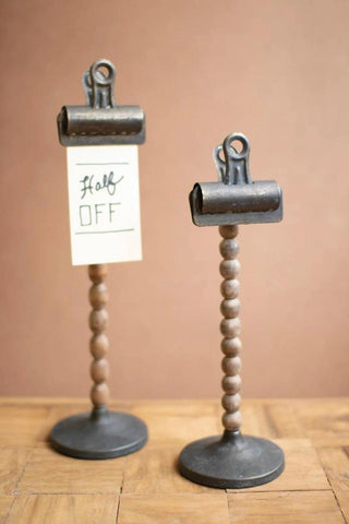 Wood bead photo holder with metal clip stand for displaying notes, photos, menus, or place cards.