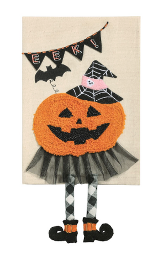 Cream cotton Halloween hand towel featuring a bouclé jack-o'-lantern with a witch hat, tulle skirt, buffalo check dangle legs, and spooky Halloween appliqué details.