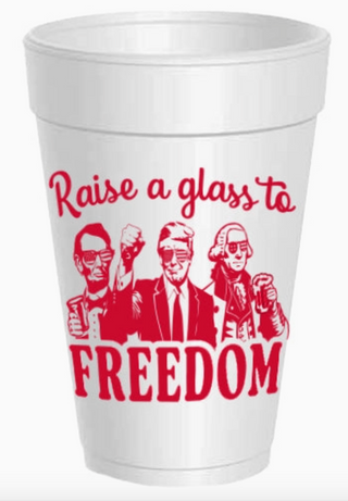 White 16 oz Styrofoam cup featuring Raise A Glass To Freedom patriotic design in red lettering