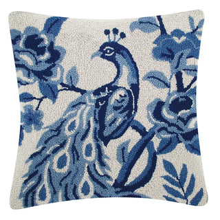 Chinoiserie peacock hook pillow with blue floral design on ivory background