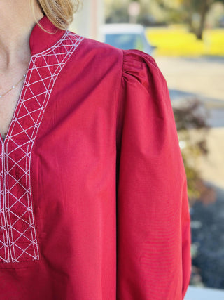 Rust 3/4 sleeve blouse with embroidered trim and split neckline

Holly Top in rust featuring puff sleeves and embroidered V-neck

Lightweight rust top with 3/4 puff sleeves and stitched neckline detail
