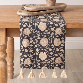 72" x 13" navy cotton table runner featuring an elegant floral block print design with cream tassel accents, perfect for everyday dining and seasonal entertaining.