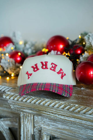 Upside Down Merry canvas cap with plaid brim and red embroidery

Cream and red plaid Christmas hat with upside down Merry text

Holiday plaid cap with puff embroidered Merry lettering

Festive Christmas trucker hat with plaid bill and canvas top

Upside Down Merry holiday cap styled with red ornaments