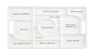 White ceramic charcuterie board with 11 sections and side handles
