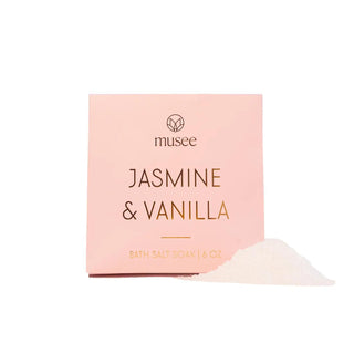 Jasmine and vanilla mini bath salt soak with pink packaging and loose bath salts