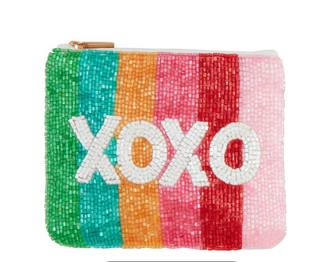 Valentine beaded zip pouch with heart design

Pink beaded Valentine coin purse with hearts

Beaded Valentine pouch with lips pattern

XOXO rainbow beaded zip case for Valentine’s Day

Small Valentine beaded cosmetic pouch on pink background