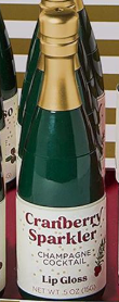 Champagne Bottle Lip Gloss in Peppermint Fizz, Espresso Frost, and Cranberry Sparkler
