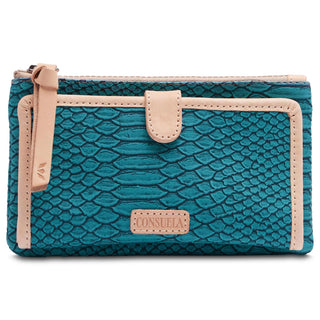 “Consuela Indy Slim Wallet in turquoise reptile texture with leather trim”

“Indy Consuela wallet with teal embossed snake print and zipper compartment”

“Consuela Indy Slim Wallet interior with coral glitter card slots”

“Turquoise Consuela wallet with 12 card slots and ID window”

“Consuela Indy Slim Wallet made in Mexico with snap closure”