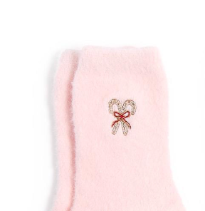 Pink fuzzy Christmas socks with embroidered holiday icons