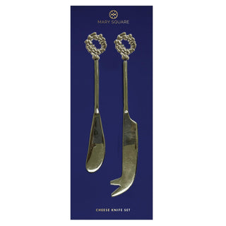 Set of two gold holiday cheese knives with festive handles

Gold cheese knife set with wreath and bow handle designs

Elegant holiday cheese knives on navy backing card

Two-piece gold cheese knife set for entertaining

Mary Square holiday cheese knife set with giftable design
