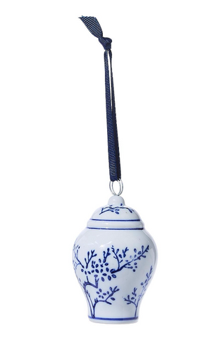 Blue and white porcelain temple jar ornaments with navy hanging ribbons and chinoiserie floral patterns.